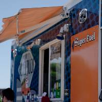 Racers at the falafel truck after finishing.